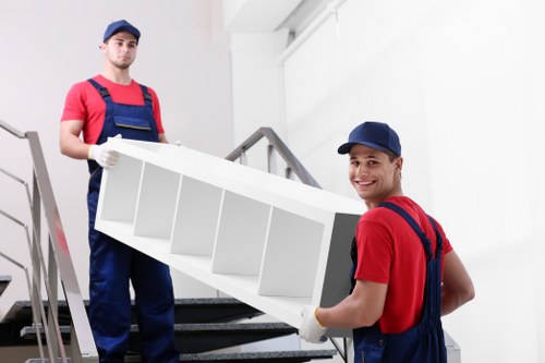 Office removal team preparing to move business furniture in Barnet
