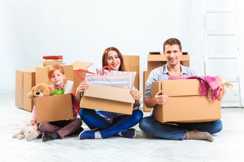 Removal van and moving team in Barnet residential street
