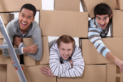 Packed moving boxes ready for transport in a Barnet home