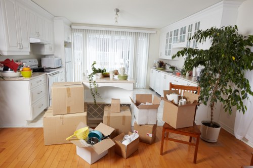 Barnet moving team preparing items for transport in a flat or house move