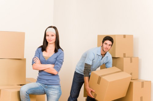 Furniture being moved from a Barnet property with stairs