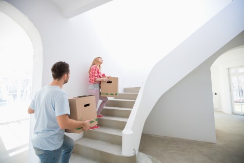 Office relocation items and moving equipment arranged for transport