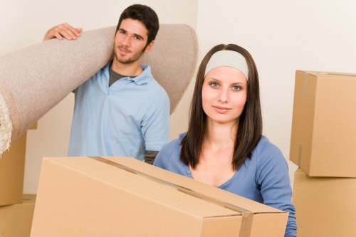 Unpacking boxes into rooms after a move in Barnet