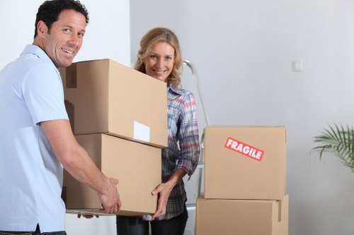 Furniture pick-up team loading office furniture in Barnet